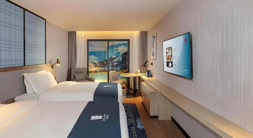 Bed in Echarm Hotel Chengdu Global Center Century City New Exhibition