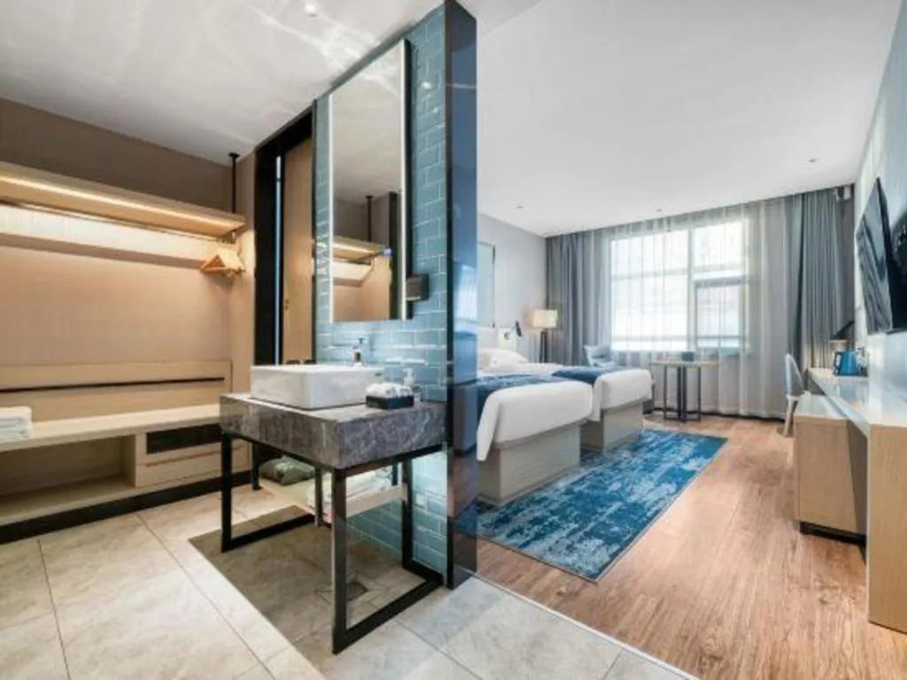 Bed in Echarm Hotel Chengdu Global Center Century City New Exhibition