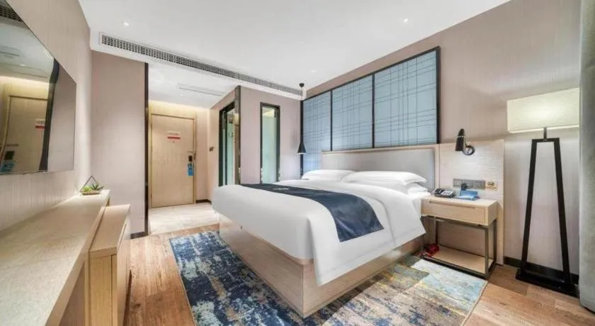 Bed in Echarm Hotel Chengdu Global Center Century City New Exhibition