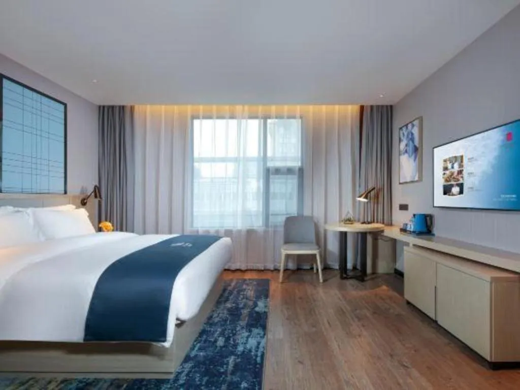 Bed in Echarm Hotel Chengdu Global Center Century City New Exhibition