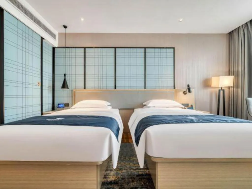 Bed in Echarm Hotel Chengdu Global Center Century City New Exhibition