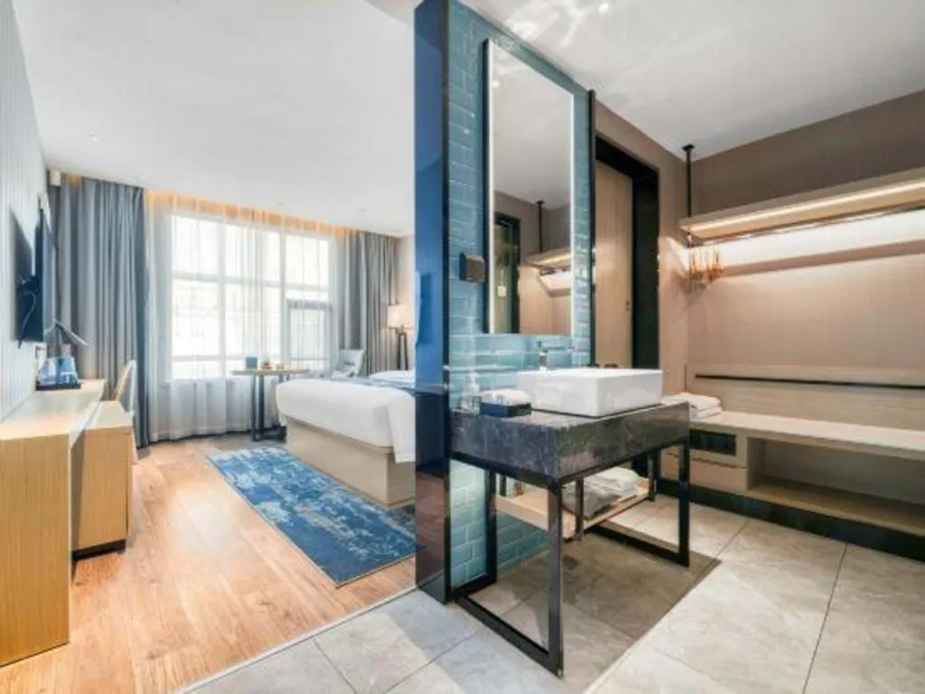 Bed in Echarm Hotel Chengdu Global Center Century City New Exhibition