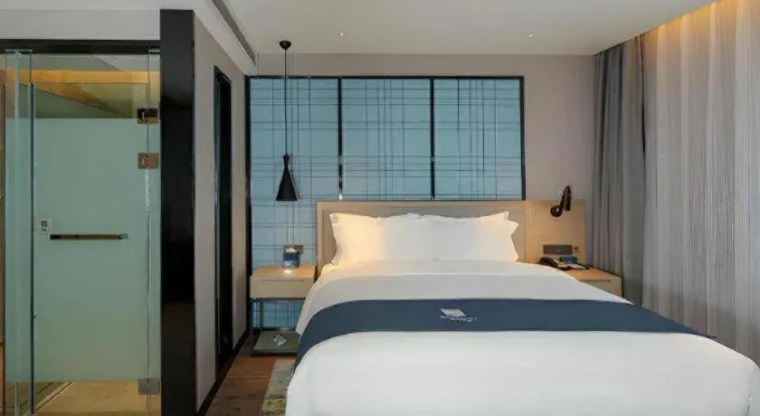 Bed in Echarm Hotel Chengdu Global Center Century City New Exhibition