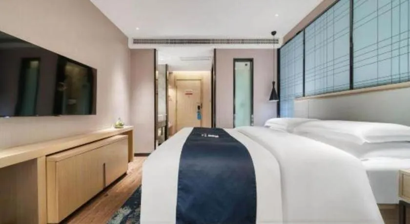Bed in Echarm Hotel Chengdu Global Center Century City New Exhibition