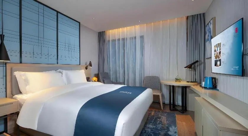 Bed in Echarm Hotel Chengdu Global Center Century City New Exhibition