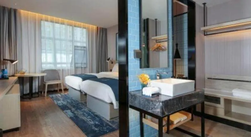 Bed in Echarm Hotel Chengdu Global Center Century City New Exhibition