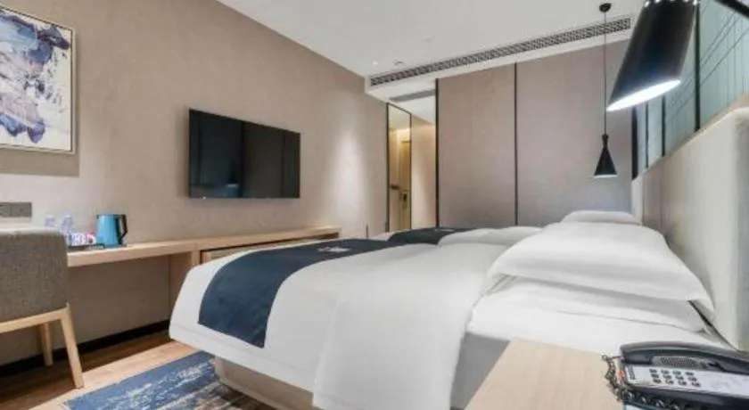 Bed in Echarm Hotel Chengdu Global Center Century City New Exhibition