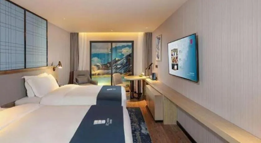 Bed in Echarm Hotel Chengdu Global Center Century City New Exhibition