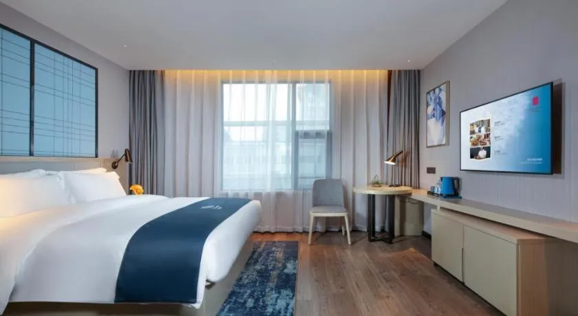 Bed in Echarm Hotel Chengdu Global Center Century City New Exhibition