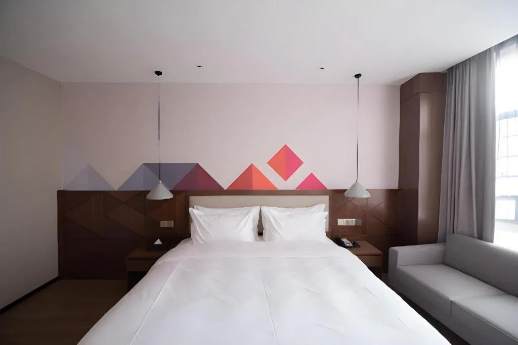 Bed in Borrman Hotel Baise High-speed Railway Station Hengning Plaza