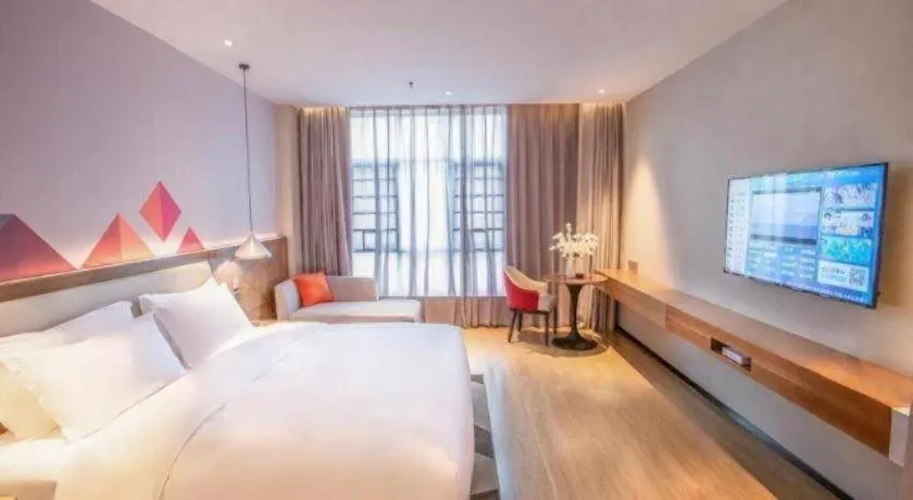 Bed in Borrman Hotel Baise High-speed Railway Station Hengning Plaza