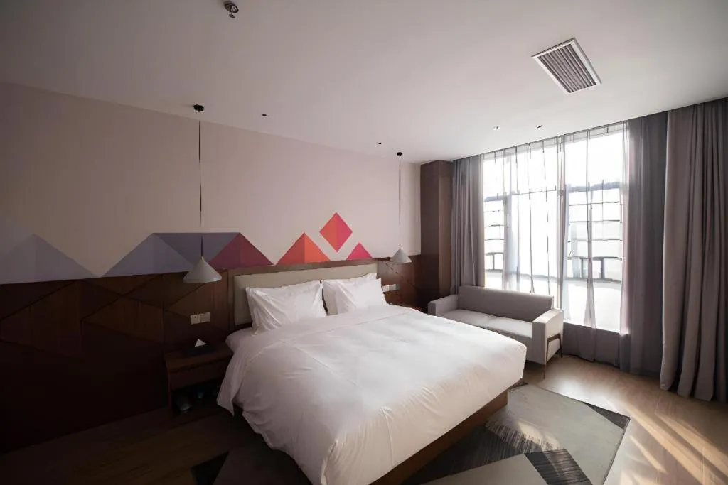 Bed in Borrman Hotel Baise High-speed Railway Station Hengning Plaza