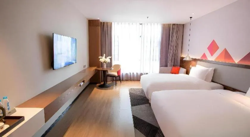 Bed in Borrman Hotel Baise High-speed Railway Station Hengning Plaza