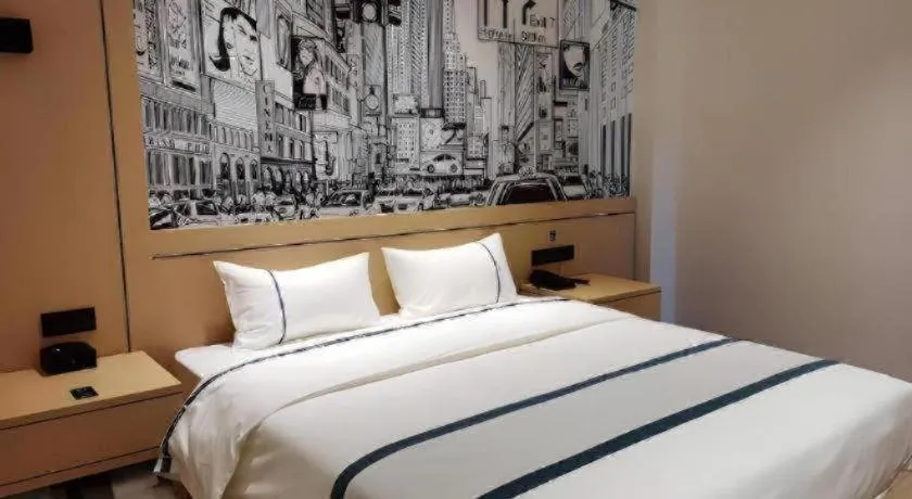 Bed in City Comfort Inn Jingzhou Fantawild Shashi Middle School