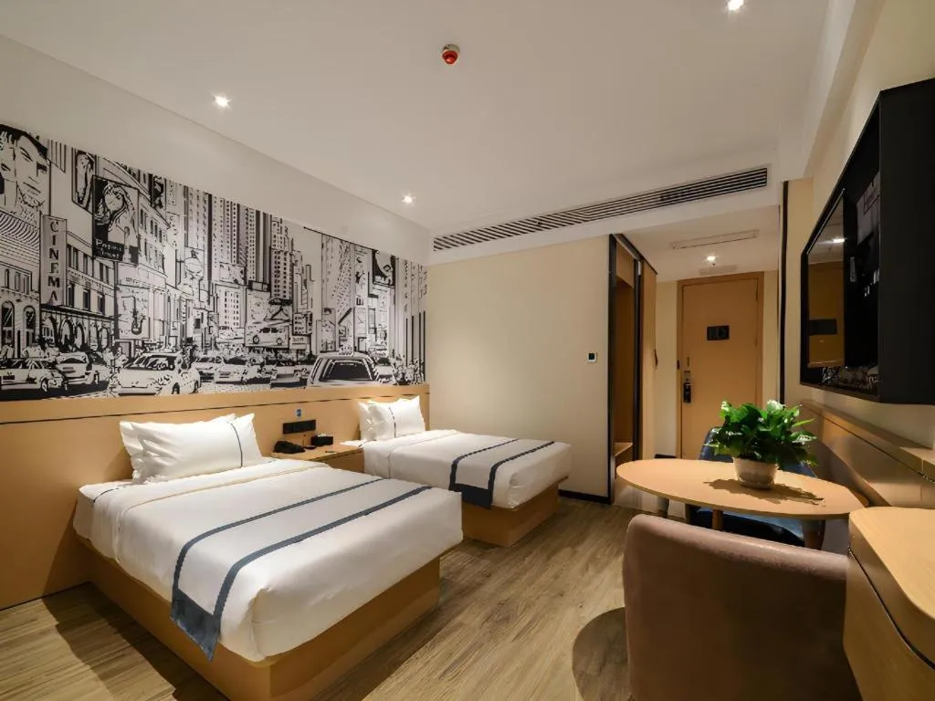 Bed in City Comfort Inn Jingzhou Fantawild Shashi Middle School