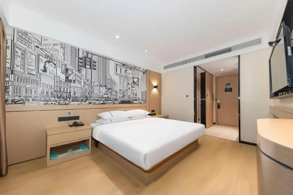 Bed in City Comfort Inn Jingzhou Fantawild Shashi Middle School