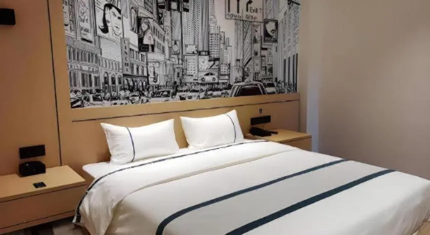 Bed in City Comfort Inn Jingzhou Fantawild Shashi Middle School