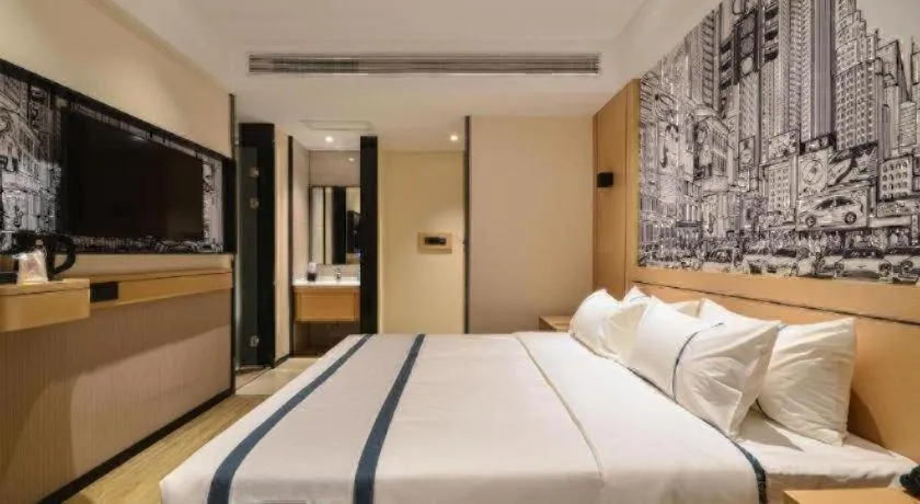 Bed in City Comfort Inn Jingzhou Fantawild Shashi Middle School