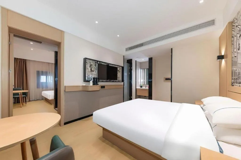 Bed in City Comfort Inn Jingzhou Fantawild Shashi Middle School