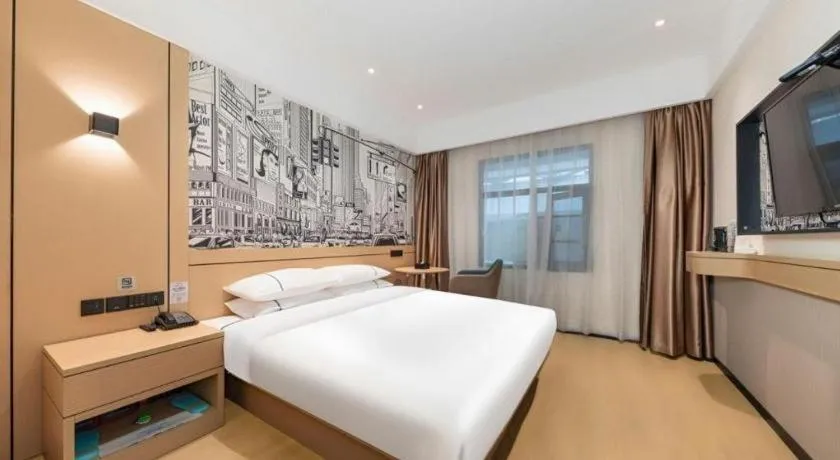 Bed in City Comfort Inn Jingzhou Fantawild Shashi Middle School
