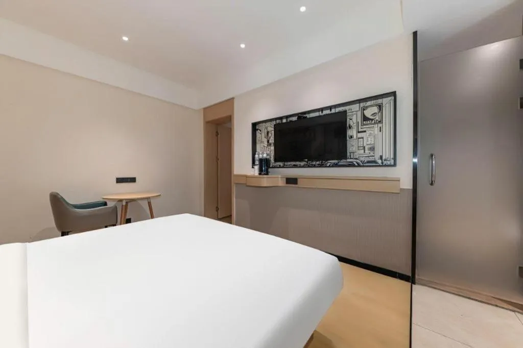 Bed in City Comfort Inn Jingzhou Fantawild Shashi Middle School