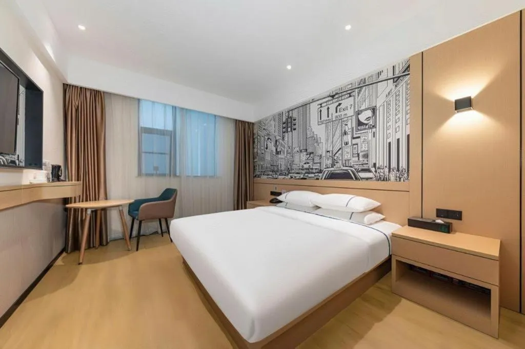 Bed in City Comfort Inn Jingzhou Fantawild Shashi Middle School