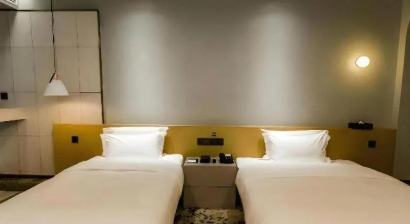 Bed in Borrman Hotel Jining High-tech Huangtun