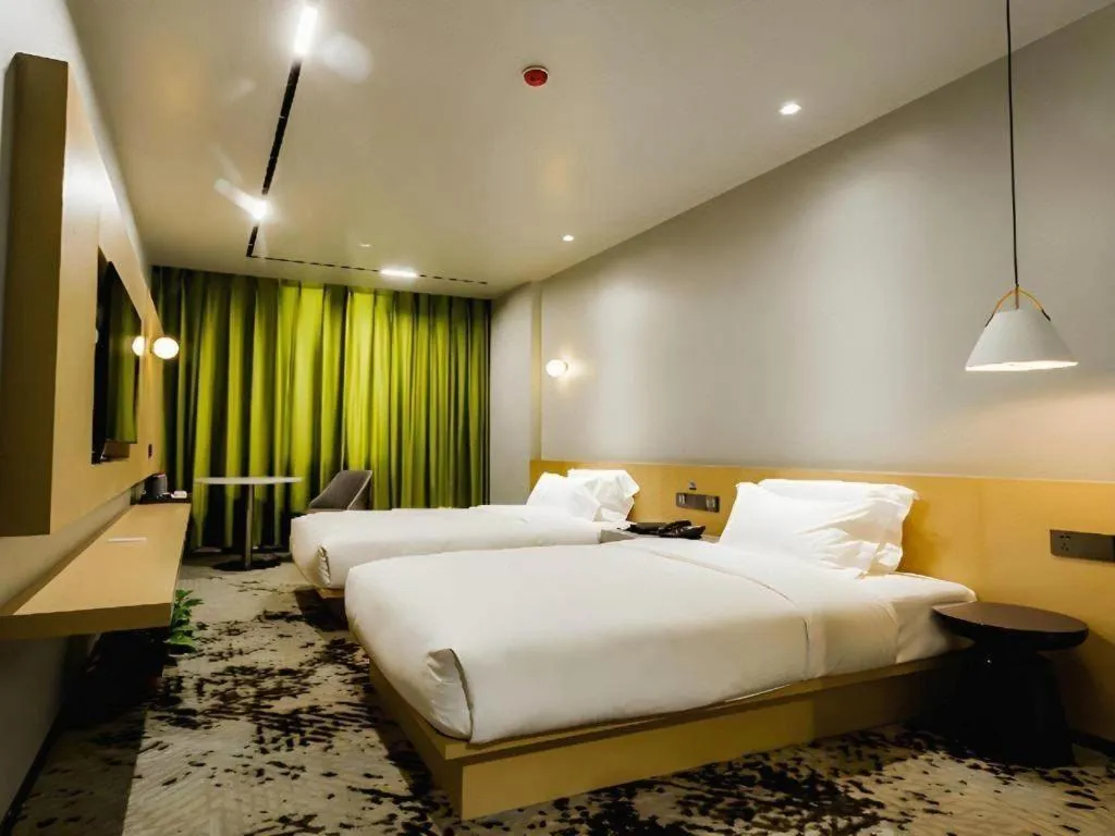 Bed in Borrman Hotel Jining High-tech Huangtun