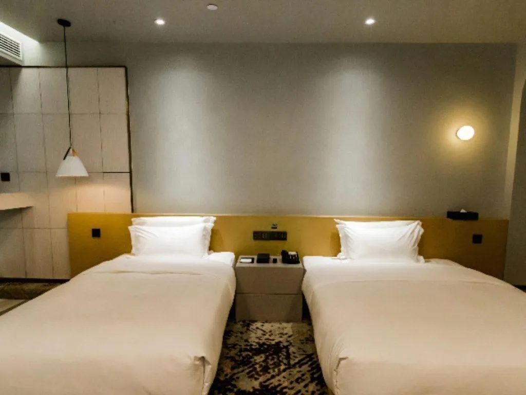 Bed in Borrman Hotel Jining High-tech Huangtun