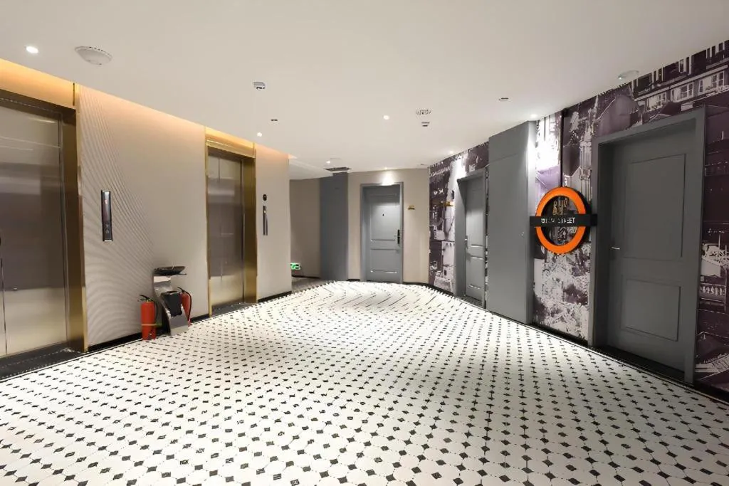 Bed in Premier City Comfort Hotel Hechi Luocheng Central Plaza