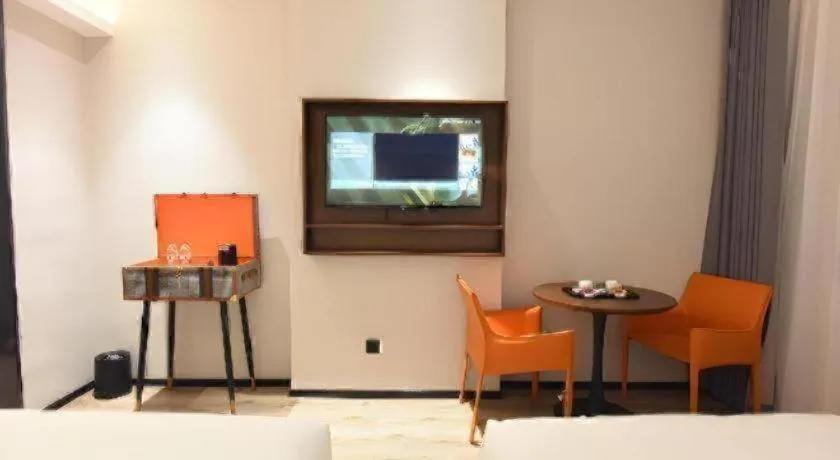 Bed in Premier City Comfort Hotel Hechi Luocheng Central Plaza