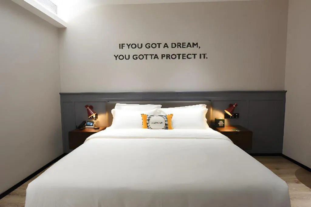 Bed in Premier City Comfort Hotel Hechi Luocheng Central Plaza