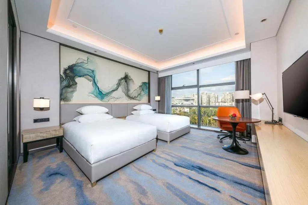 Bed in New Century Grand Hotel Ningbo Zhongdu
