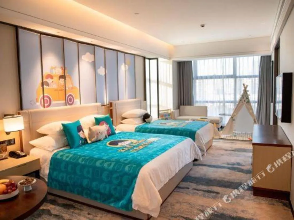 Bed in New Century Grand Hotel Ningbo Zhongdu