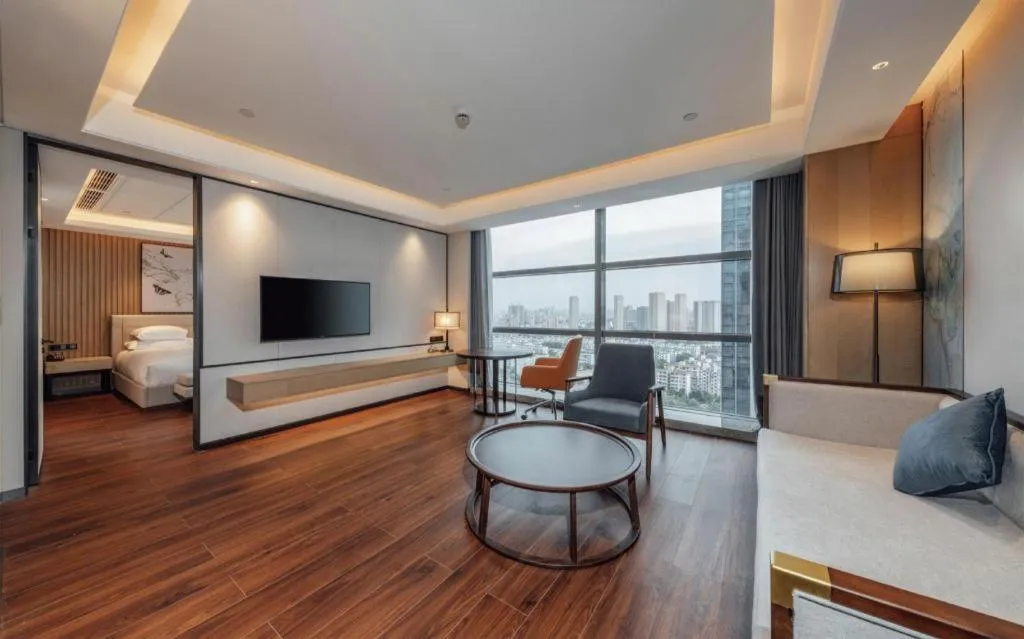 Bed in New Century Grand Hotel Ningbo Zhongdu