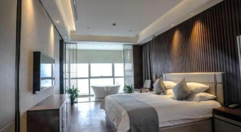 Bed in New Century Grand Hotel Ningbo Zhongdu