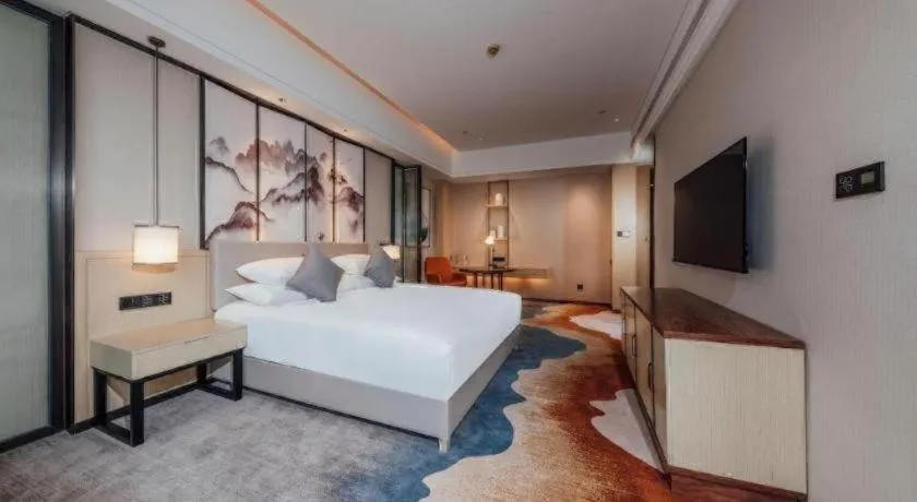 Bed in New Century Grand Hotel Ningbo Zhongdu