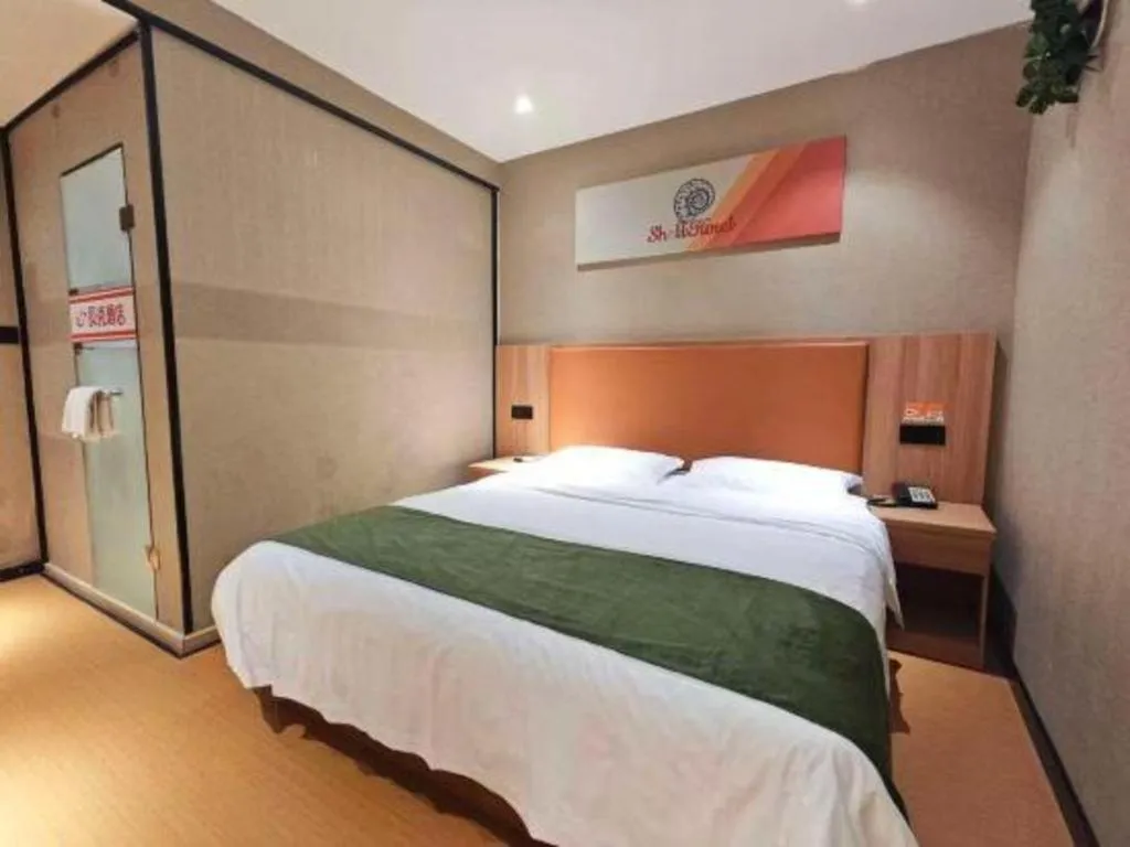 Bed in Shell Hotel Shnaghai Beiqiao Metro Station
