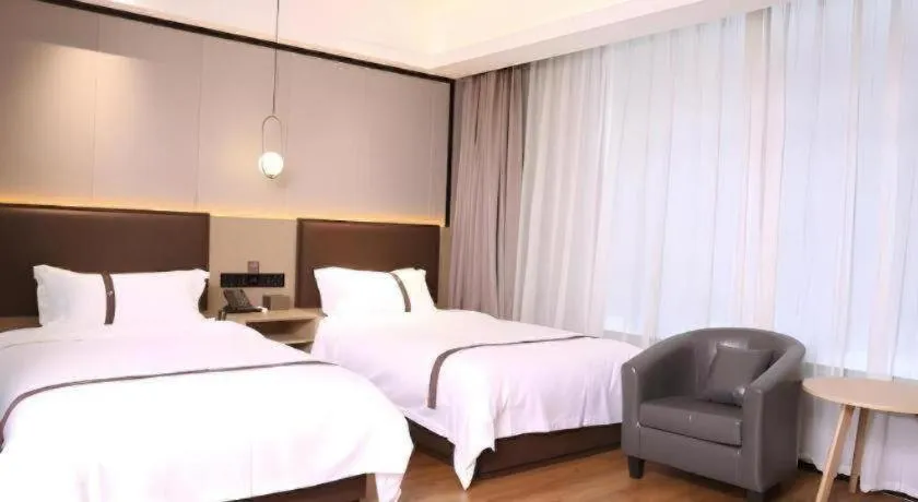 Bed in Gya Hotel Beijing Shunyi Yanjing Bridge