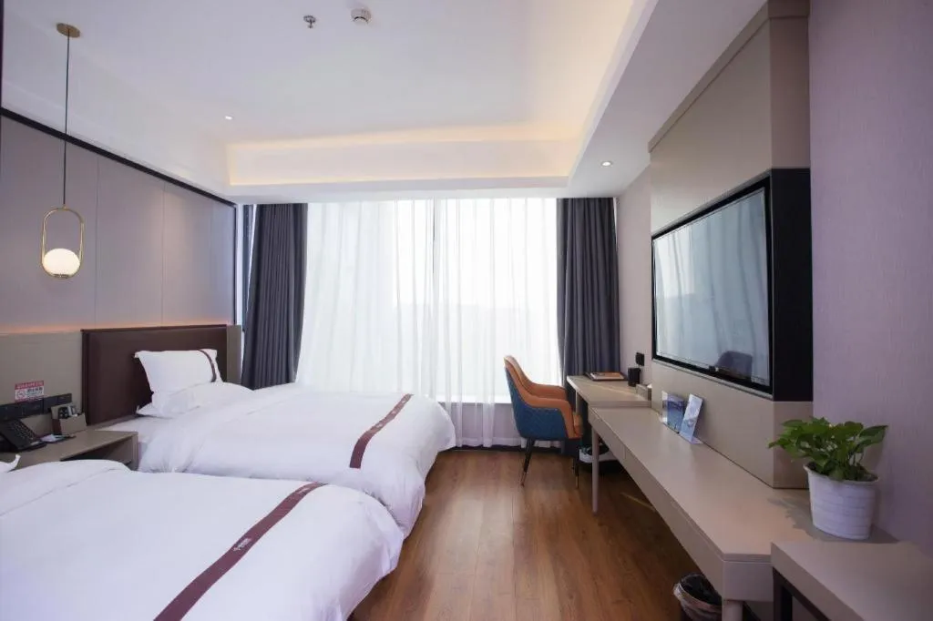 Bed in Gya Hotel Beijing Shunyi Yanjing Bridge