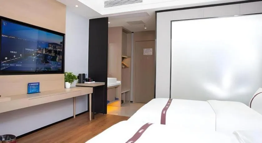 Bed in Gya Hotel Beijing Shunyi Yanjing Bridge