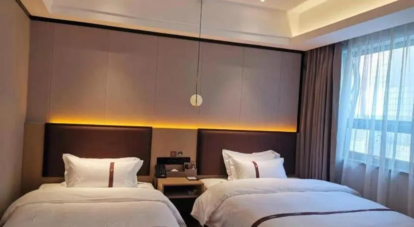 Bed in Gya Hotel Beijing Shunyi Yanjing Bridge