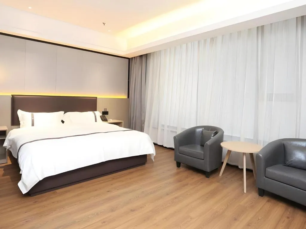 Bed in Gya Hotel Beijing Shunyi Yanjing Bridge