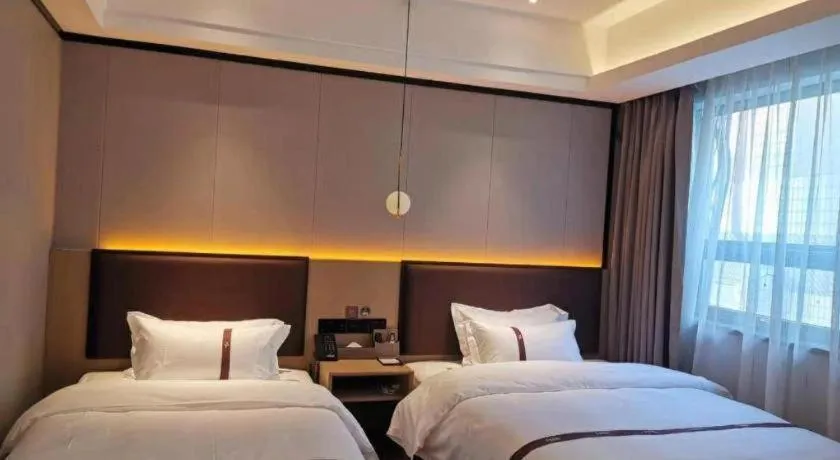 Bed in Gya Hotel Beijing Shunyi Yanjing Bridge