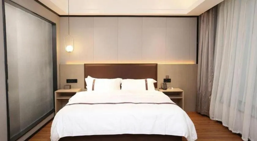 Bed in Gya Hotel Beijing Shunyi Yanjing Bridge