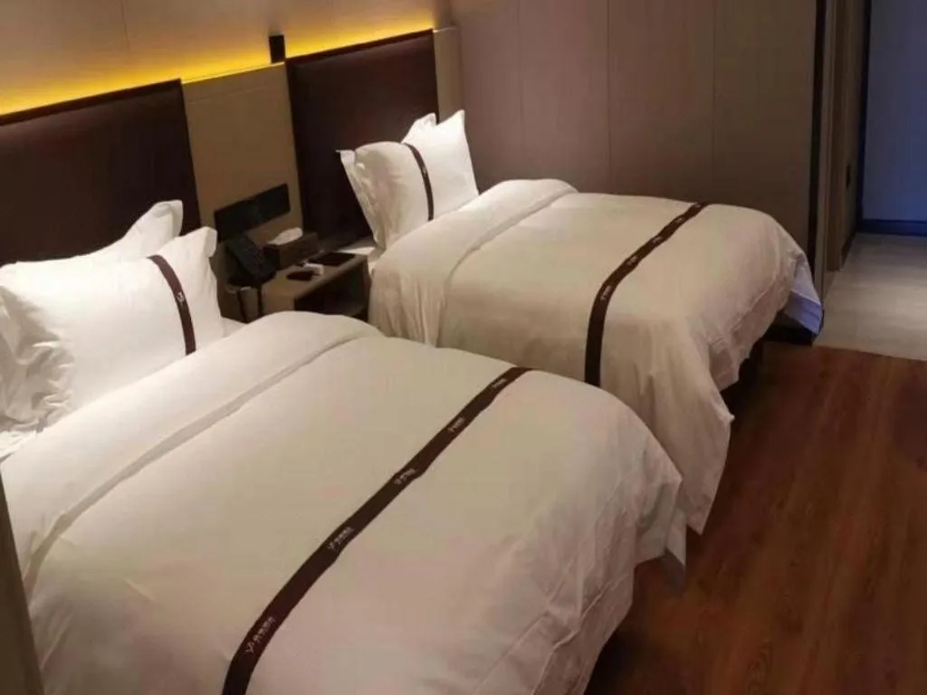 Bed in Gya Hotel Beijing Shunyi Yanjing Bridge
