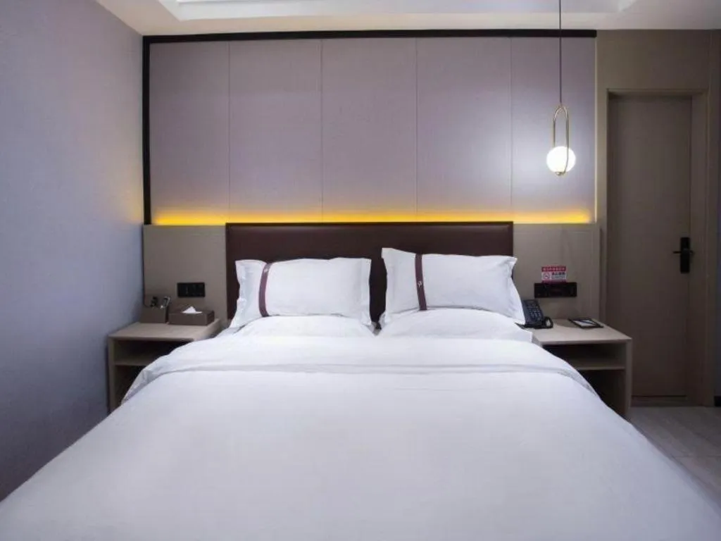 Bed in Gya Hotel Beijing Shunyi Yanjing Bridge