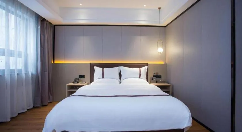 Bed in Gya Hotel Beijing Shunyi Yanjing Bridge