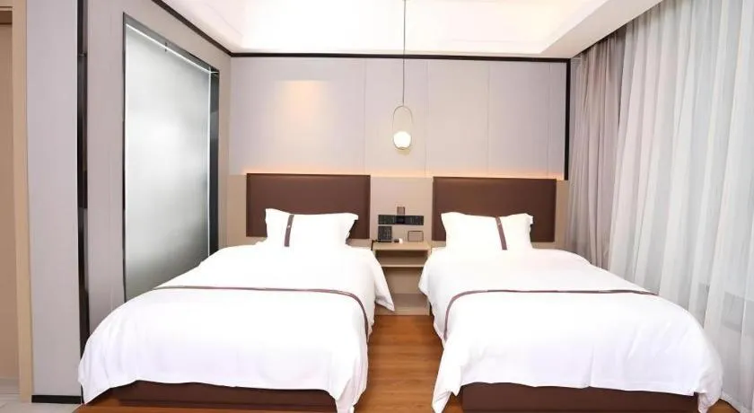 Bed in Gya Hotel Beijing Shunyi Yanjing Bridge