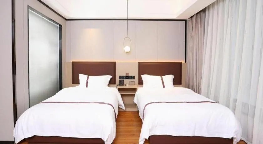 Bed in Gya Hotel Beijing Shunyi Yanjing Bridge